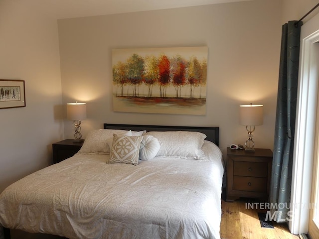 24 Mangum Dr Unit 1, Donnelly, ID 83615 - bedroom featuring wood finished floors