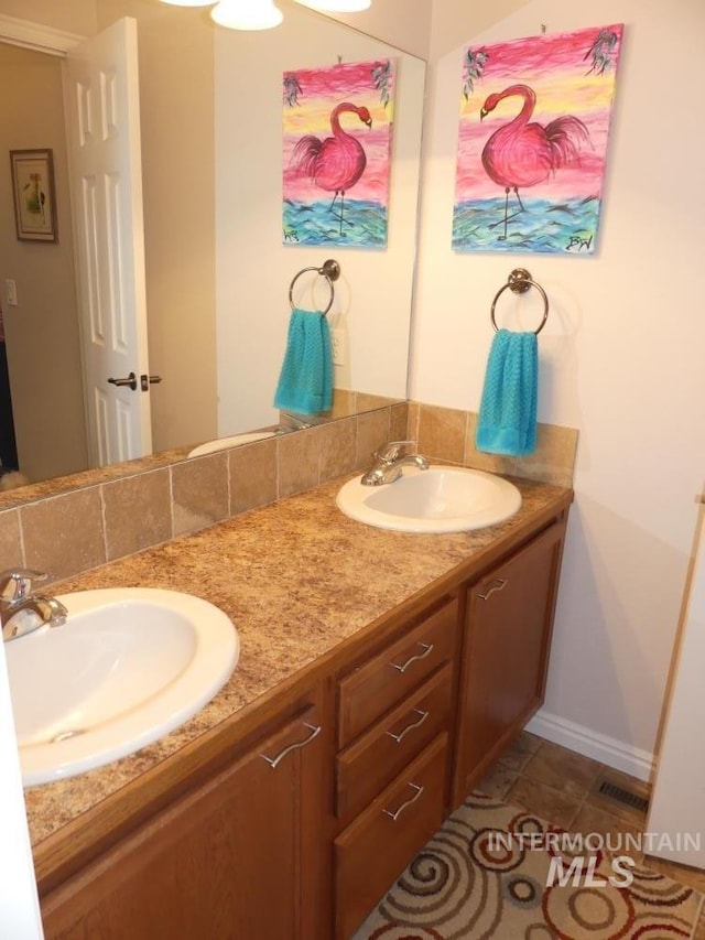 24 Mangum Dr Unit 1, Donnelly, ID 83615 - bathroom with double vanity and baseboards