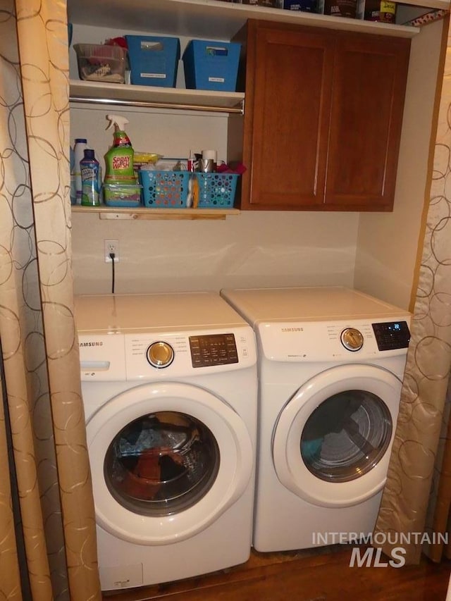 24 Mangum Dr Unit 1, Donnelly, ID 83615 - laundry room featuring independent washer and dryer and cabinet space