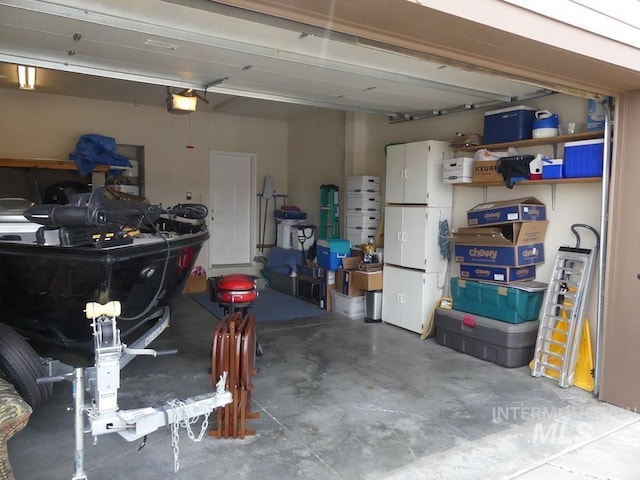 24 Mangum Dr Unit 1, Donnelly, ID 83615 - garage featuring a garage door opener