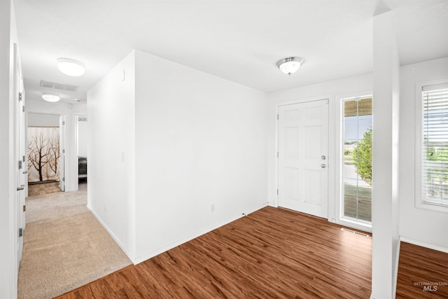 entrance foyer with hardwood / wood-style floors