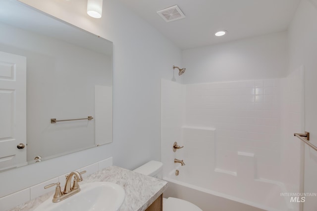 full bathroom featuring vanity, toilet, and shower / bath combination