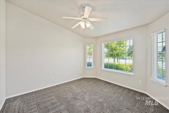 3804 Stonehedge Way, Caldwell, ID 83605 - spare room featuring carpet, a textured ceiling, ceiling fan, and lofted ceiling