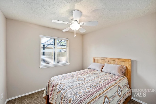 3804 Stonehedge Way, Caldwell, ID 83605 - bedroom with carpet, a ceiling fan, and a textured ceiling