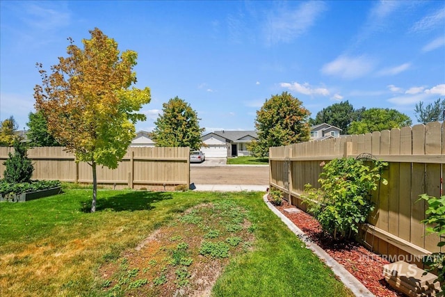 3804 Stonehedge Way, Caldwell, ID 83605 - view of yard featuring a residential view and a garden