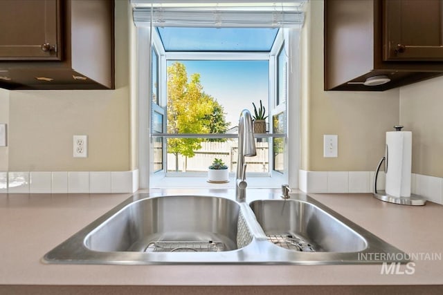 3804 Stonehedge Way, Caldwell, ID 83605 - kitchen view of light countertops and dark brown cabinetry