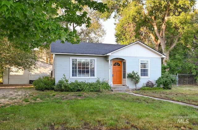 view of front of home with a front yard