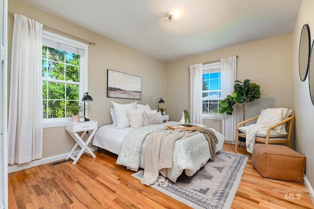 bedroom featuring light hardwood / wood-style floors