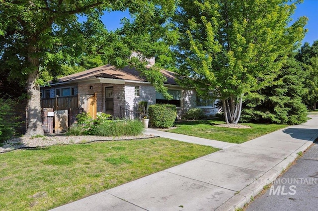 1207 N 19th St, Boise, ID 83702 - view of front of house with stone siding and a front lawn