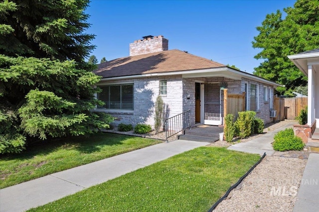 1207 N 19th St, Boise, ID 83702 - view of front of property with stone siding and a chimney