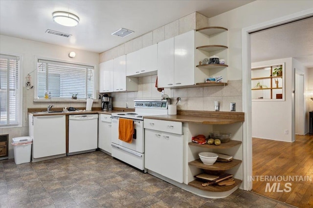 1207 N 19th St, Boise, ID 83702 - kitchen featuring white appliances, open shelves, white cabinetry, and plenty of natural light