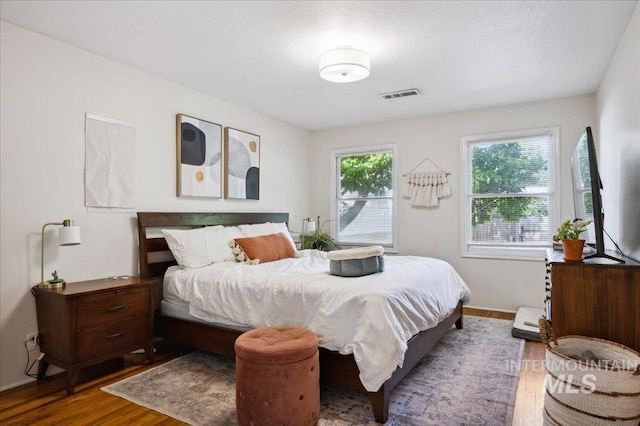1207 N 19th St, Boise, ID 83702 - bedroom featuring wood finished floors