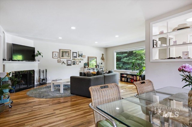 1207 N 19th St, Boise, ID 83702 - dining area featuring wood finished floors, a fireplace, and recessed lighting