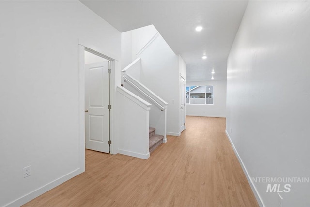 corridor featuring light hardwood / wood-style flooring