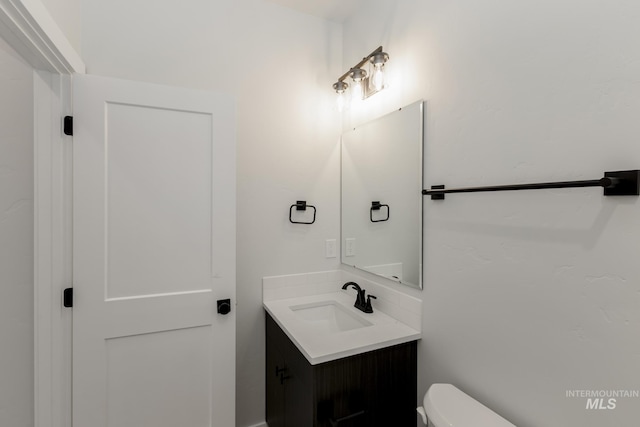 2827 N Rocky Bottom Way, Kuna, ID 83634 - half bathroom with vanity and toilet