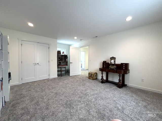 interior space with recessed lighting, visible vents, baseboards, and carpet flooring