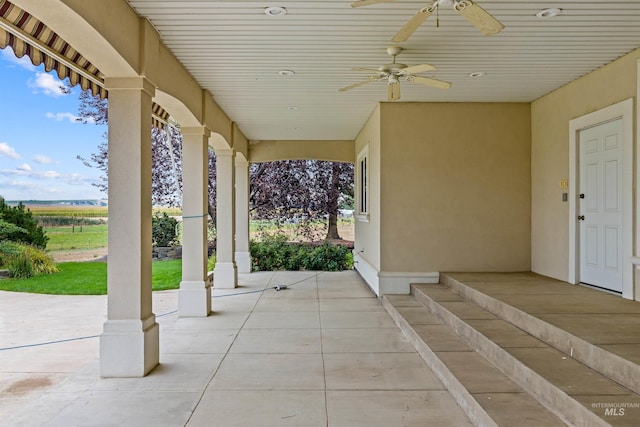 view of patio with ceiling fan