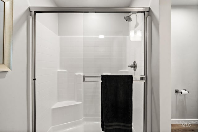 bathroom featuring a stall shower