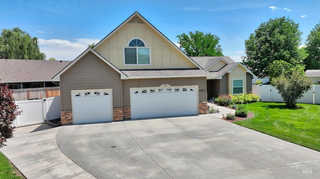 1452 Sagittarius Ct, Nampa, ID 83651 - view of front of property with board and batten siding, concrete driveway, a shingled roof, stone siding, and a garage