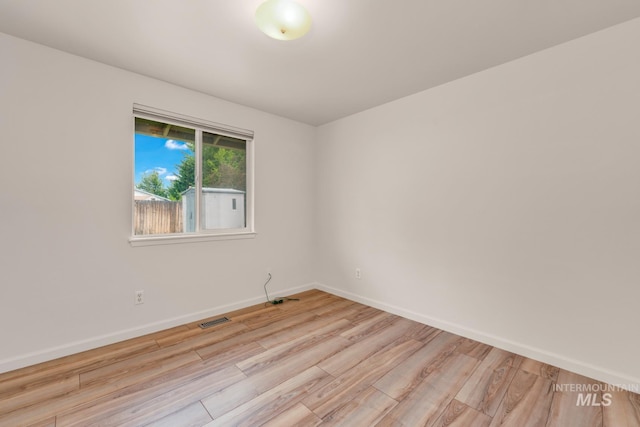 10834 W Linstock Ct, Boise, ID 83713 - empty room featuring wood finished floors and baseboards