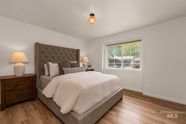 10834 W Linstock Ct, Boise, ID 83713 - bedroom with wood finished floors and baseboards