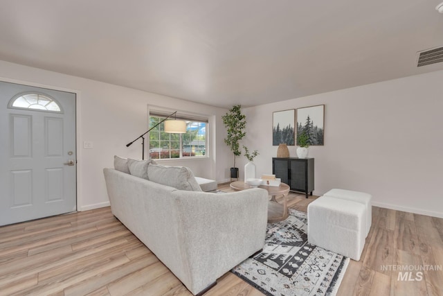 10834 W Linstock Ct, Boise, ID 83713 - living area with light wood finished floors and baseboards
