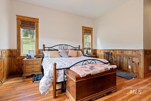 bedroom with light hardwood / wood-style floors