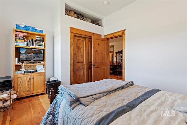 bedroom featuring light hardwood / wood-style flooring