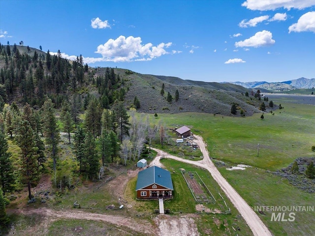 drone / aerial view featuring a mountain view