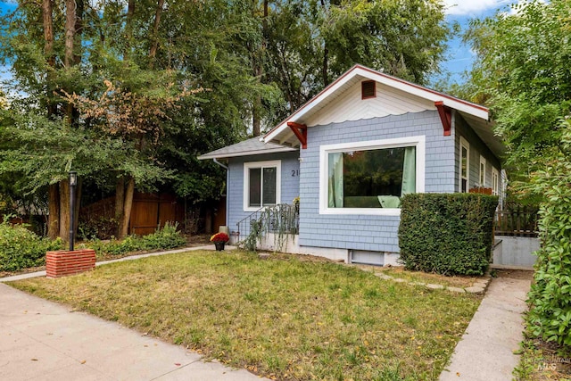 exterior space featuring a front lawn