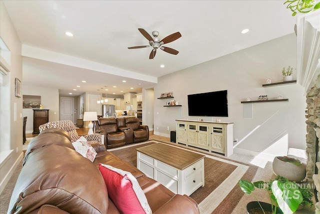 5726 N Morpheus Way, Meridian, ID 83642 - living room with a ceiling fan, baseboards, and recessed lighting
