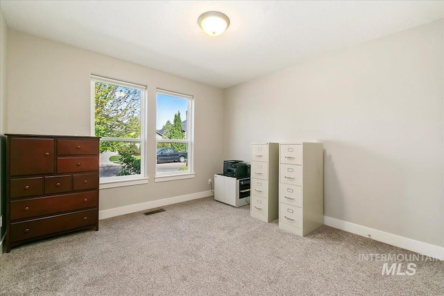 5726 N Morpheus Way, Meridian, ID 83642 - bedroom with light colored carpet, multiple windows, and baseboards