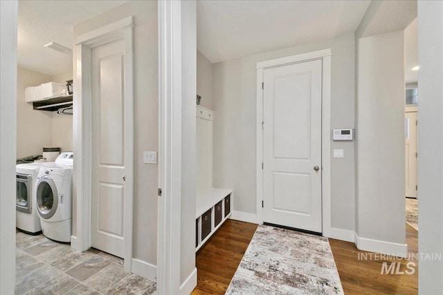 5726 N Morpheus Way, Meridian, ID 83642 - laundry room with washer and dryer, baseboards, and wood finished floors