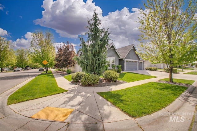 5726 N Morpheus Way, Meridian, ID 83642 - view of front of home featuring a front yard, a garage, and driveway