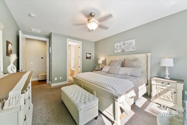 5726 N Morpheus Way, Meridian, ID 83642 - bedroom featuring carpet, baseboards, ensuite bathroom, and a ceiling fan