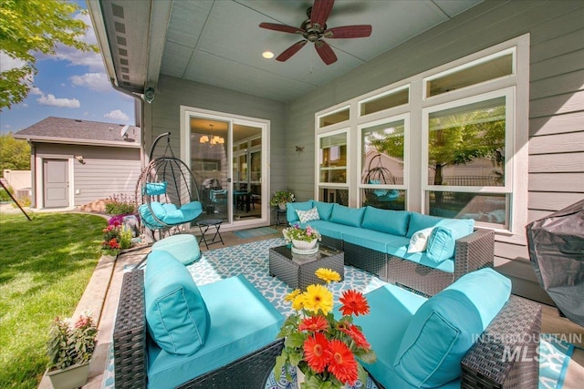 5726 N Morpheus Way, Meridian, ID 83642 - view of patio with an outdoor living space and a ceiling fan