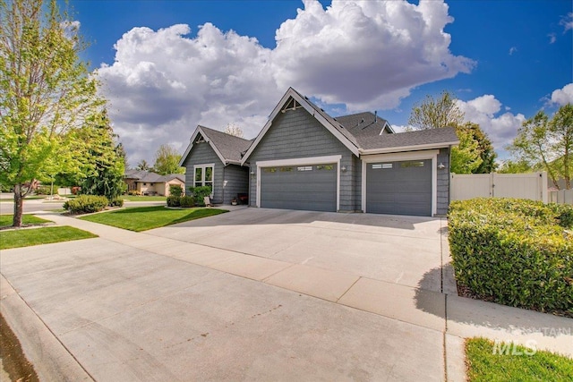 5726 N Morpheus Way, Meridian, ID 83642 - view of front of property with an attached garage, driveway, and fence