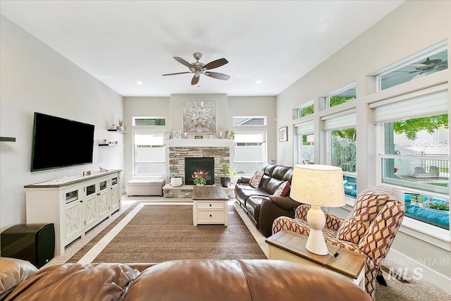 5726 N Morpheus Way, Meridian, ID 83642 - living area featuring a fireplace, a ceiling fan, and recessed lighting
