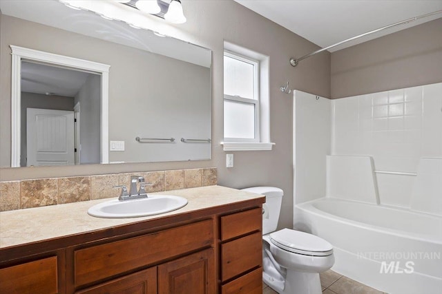 full bathroom featuring decorative backsplash, toilet, shower / bathtub combination, vanity, and tile patterned floors