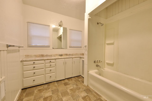 bathroom with bathing tub / shower combination and vanity