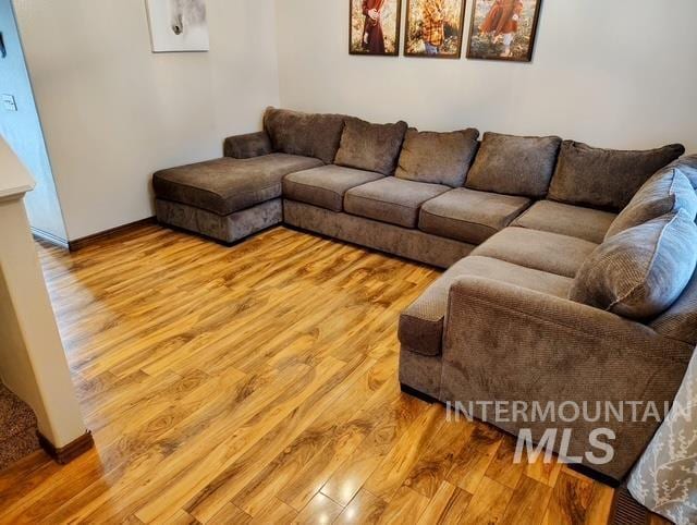 2150 W Shy Crk, Nampa, ID 83686 - living area featuring wood finished floors and baseboards