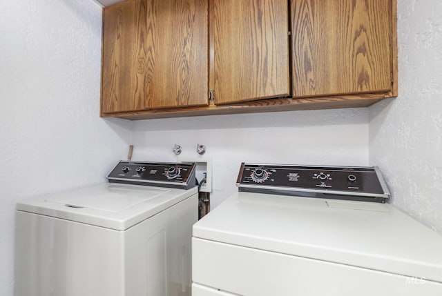 2144 Crestwood Dr, Twin Falls, ID 83301 - laundry area with washer and clothes dryer and cabinet space