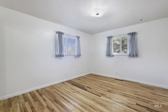 2144 Crestwood Dr, Twin Falls, ID 83301 - empty room with baseboards and light wood-style floors