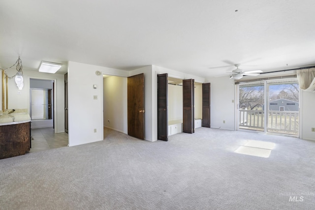 2144 Crestwood Dr, Twin Falls, ID 83301 - unfurnished living room with a ceiling fan and light carpet