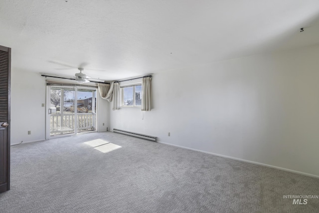 2144 Crestwood Dr, Twin Falls, ID 83301 - carpeted empty room with a baseboard radiator, a ceiling fan, and baseboards