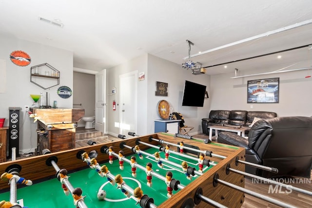 playroom featuring wood-type flooring