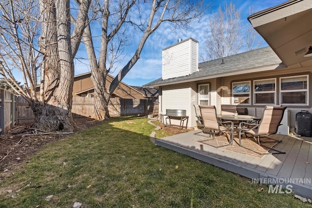 view of yard featuring a wooden deck