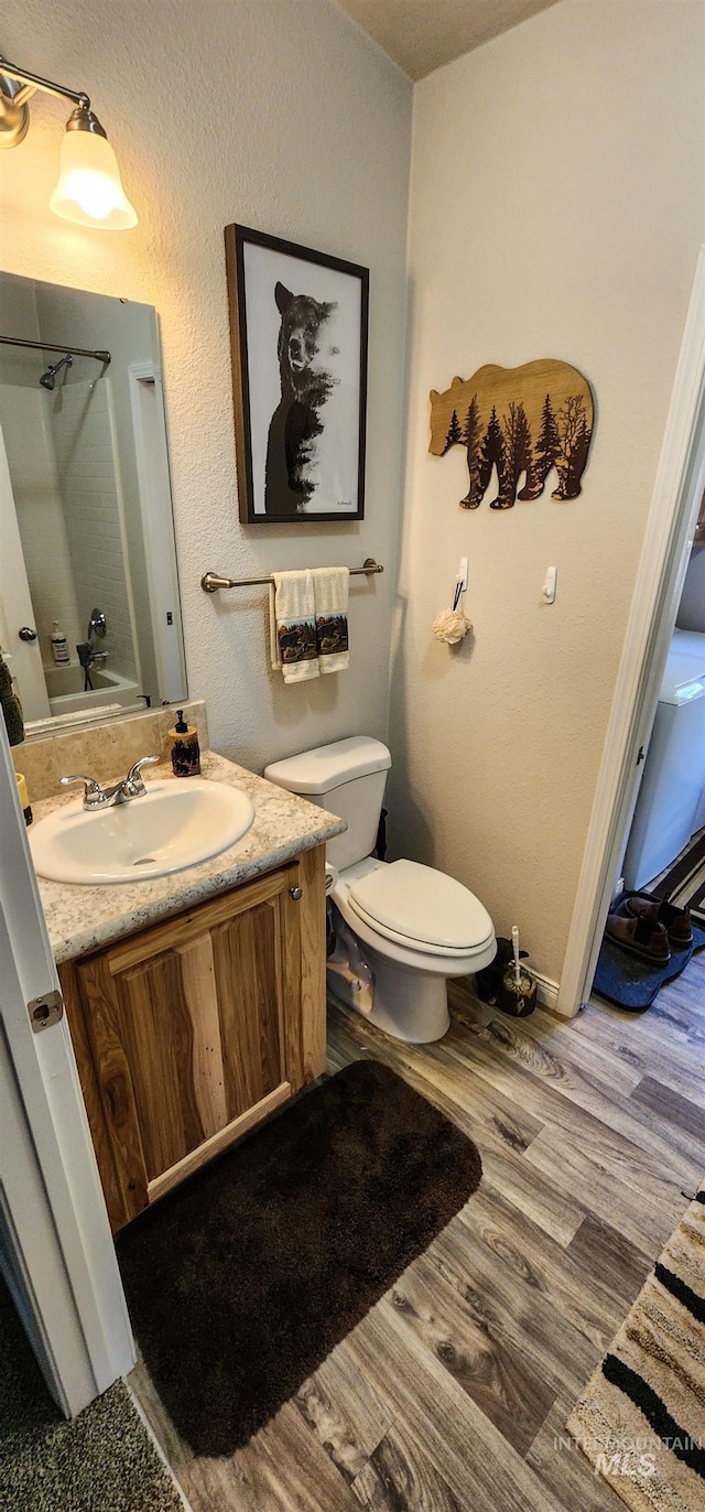 110 Memory Ln, Kamiah, ID 83536 - bathroom featuring wood finished floors, toilet, and vanity