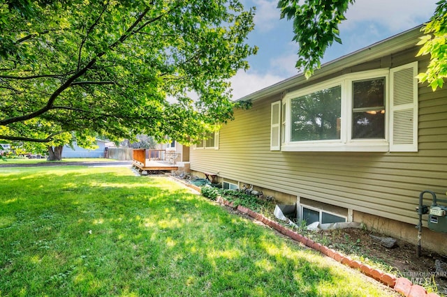 view of yard with a wooden deck