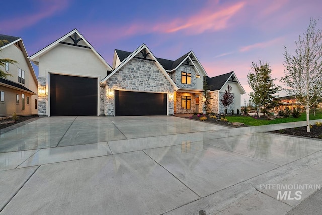 view of front facade featuring an attached garage, stucco siding, stone siding, and concrete driveway